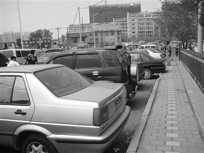 哈尔滨二手车车商:马路市场不绝进厅难生存