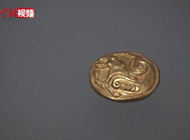虎纹圆金牌在新疆博物馆受热捧