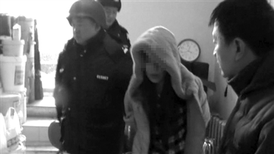 哈市警方将犯罪嫌疑人吕南抓获 哈市警方将犯罪嫌疑人吕南抓获