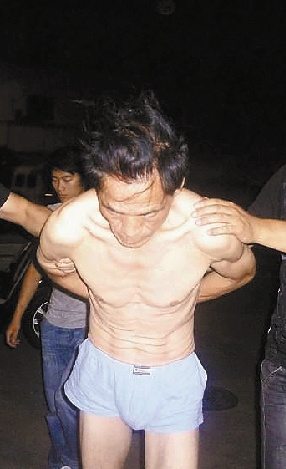 许德勇被捕。 资料图片 许德勇被捕。 资料图片