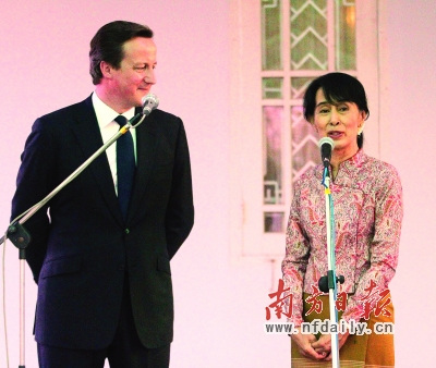 英国首相卡梅伦日前访缅时会见民盟主席昂山素季。新华社发 英国首相卡梅伦日前访缅时会见民盟主席昂山素季。新华社发