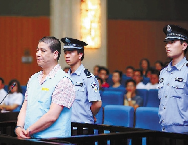 杨胜华在庭审现场.通讯员 唐克龙 摄