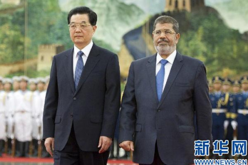 8月28日,中国国家主席胡锦涛在北京人民大会堂举行仪式,欢迎埃及总统穆尔西访华。 新华社记者 黄敬文 摄 8月28日,中国国家主席胡锦涛在北京人民大会堂举行仪式,欢迎埃及总统穆尔西访华。 新华社记者 黄敬文 摄