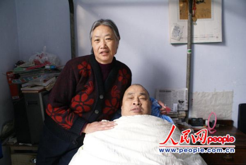 姜致莲与尹继常在家合影 (梁兼铭摄) 姜致莲与尹继常在家合影 (梁兼铭摄)
