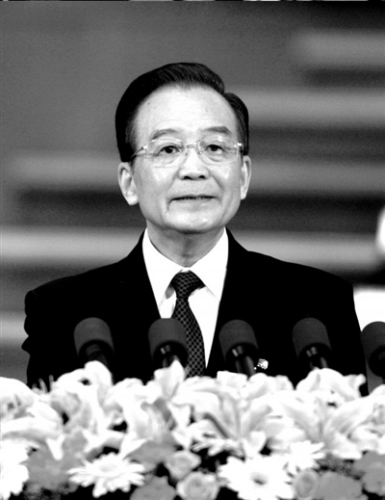 2012年3月5日,国务院总理温家宝作政府工作报告(资料图片)。新华社发 2012年3月5日,国务院总理温家宝作政府工作报告(资料图片)。新华社发