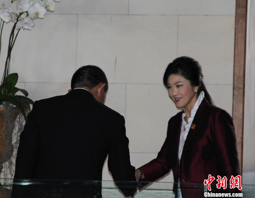 ̩������Ӣ����ϯAPEC�쵼�˺͹��̴����Ի���