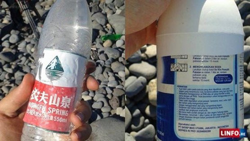 疑似MH370残骸附近地区发现中国矿泉水瓶和印尼清洁产品。(网页截图)