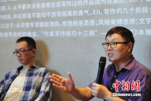 王小峰、周黎明。 王小峰、周黎明。