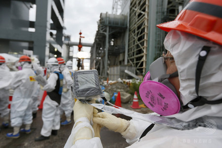 资料图:工作人员在福岛核电站进行作业。 资料图:工作人员在福岛核电站进行作业。