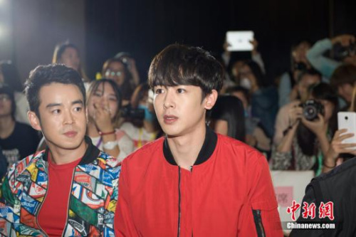 资料图:尼坤(右)。<a target='_blank' href='http://www.chinanews.com/' >中新网</a> 李卿 摄 资料图:尼坤(右)。<a target='_blank' href='http://www.chinanews.com/' >中新网</a> 李卿 摄