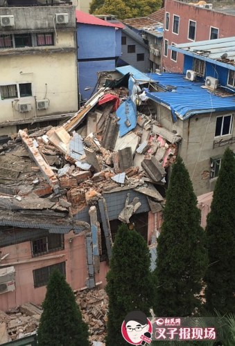 图说:事故现场仅剩断壁残垣。 图说:事故现场仅剩断壁残垣。