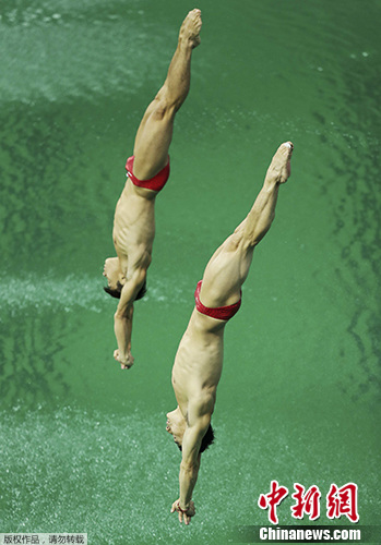 曹缘/秦凯在比赛中。 曹缘/秦凯在比赛中。