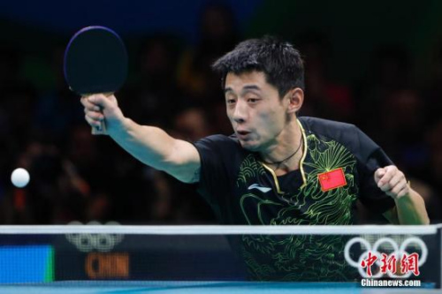 8月11日,里约奥运会乒乓球男子单打决赛,马龙战胜卫冕冠军张继科夺得冠军,成为世界上第五个实现大满贯的男子选手。<a target='_blank' href='http://www.chinanews.com/' >中新网</a>记者 盛佳鹏 摄 8月11日,里约奥运会乒乓球男子单打决赛,马龙战胜卫冕冠军张继科夺得冠军,成为世界上第五个实现大满贯的男子选手。<a target='_blank' href='http://www.chinanews.com/' >中新网</a>记者 盛佳鹏 摄