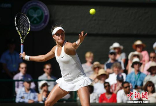 资料图:2014年温布尔登网球锦标赛女单半决赛中,加拿大新星布沙尔首次打进大满贯决赛。<a target='_blank' href='http://www.chinanews.com/'>中新社</a>发 杜洋 摄 资料图:2014年温布尔登网球锦标赛女单半决赛中,加拿大新星布沙尔首次打进大满贯决赛。<a target='_blank' href='http://www.chinanews.com/'>中新社</a>发 杜洋 摄