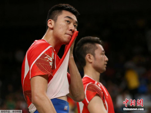 当地时间8月18日,里约奥运会羽毛球男双铜牌赛,中国组合柴飚/洪炜比赛中。 当地时间8月18日,里约奥运会羽毛球男双铜牌赛,中国组合柴飚/洪炜比赛中。