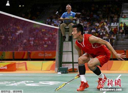 谌龙在比赛中。 谌龙在比赛中。