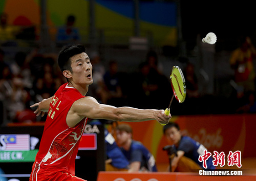 谌龙获得羽毛球男单金牌。<a target='_blank' href='http://www.chinanews.com/' >中新网</a>记者 杜洋 摄 谌龙获得羽毛球男单金牌。<a target='_blank' href='http://www.chinanews.com/' >中新网</a>记者 杜洋 摄