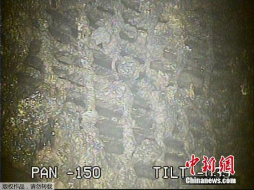 资料图:机器人在福岛核电站内探测 资料图:机器人在福岛核电站内探测