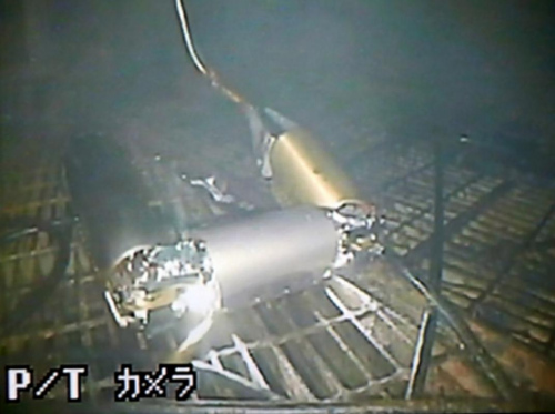 行走于东京电力福岛第一核电站1号机安全壳内的调查机器人。(由国际反应堆报废研究开发机构提供) 行走于东京电力福岛第一核电站1号机安全壳内的调查机器人。(由国际反应堆报废研究开发机构提供)