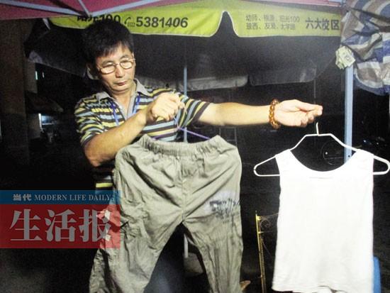 小男孩露宿街头多日不愿回家 一见到警察来就跑