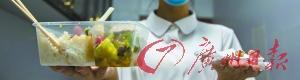 女子吃盒饭吃出一颗牙 牙医估计是猪牙(图)
