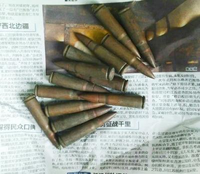 村民秧田"踩"到14颗步枪子弹 仍具一定杀伤力(图)