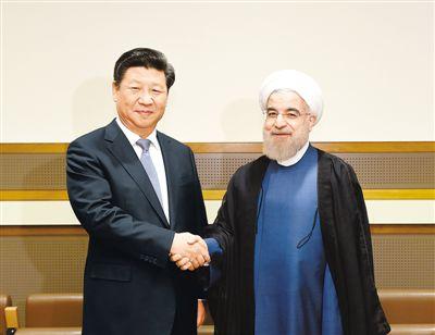 图为:国家主席习近平2015年9月28日在纽约会见伊朗总统鲁哈尼.
