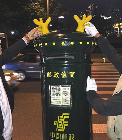 上海邮政为鹿晗邮筒戴鹿角疑遭当地城管拆除
