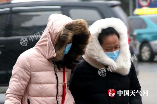 全国偏暖少雨至本周末 下周冷空气发威