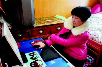 脑瘫女孩用1根拇指敲出200多万字文学作品(图)