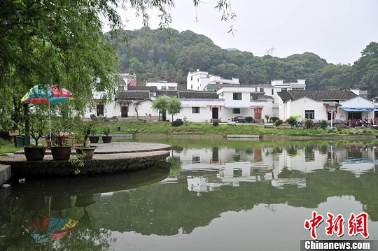 �������й��У��Ͻ𱴵ġ��л�����һ�塱��