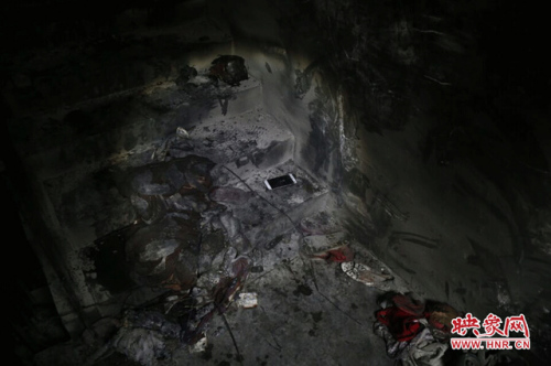 郑州一居民楼底层电表箱着火致9死5伤(图)