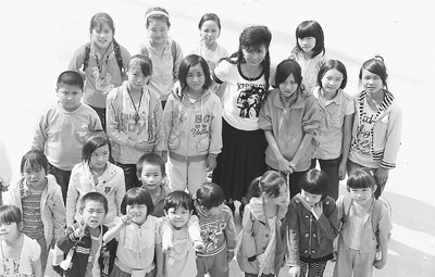 女子7年内变卖3套房2辆车办农民工子弟学校(图)