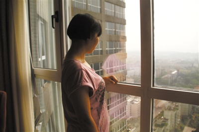 唐慧:相信邪不胜正最后悔没保护好孩子(图)