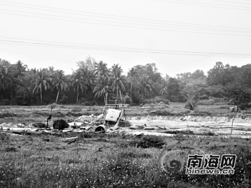 海南长丰镇农田遭非法采矿记者暗访被扇耳光