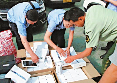 iPhone5在香港上市高利润驱使水客铤而走险