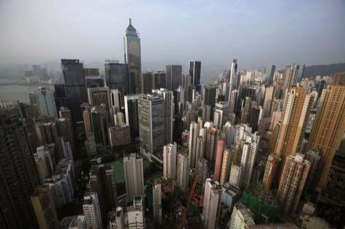 港府辣招打压楼市炒风本地地产股急挫(图)