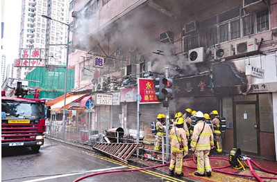 香港凉茶铺起火楼上护老院老人慌忙逃生(图)