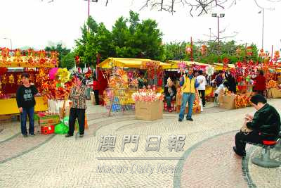 澳门妈阁庙风车档生意淡商家半卖半送提早“收炉”