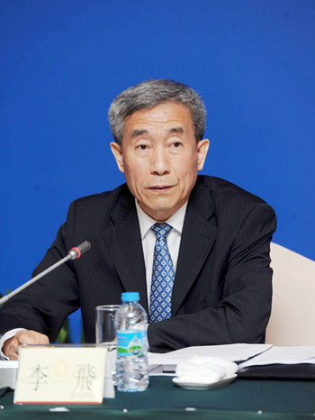 李飞:遵守香港基本法支持普选法案