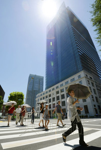 日本多地迎来“酷暑日”局地气温接近40度（图）