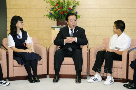 日本首相称将强力推进日俄争议领土谈判(图)