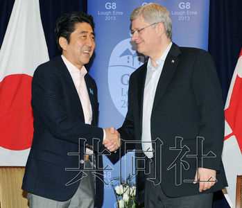 日本与加拿大首脑确认将加强TPP相关合作(图)