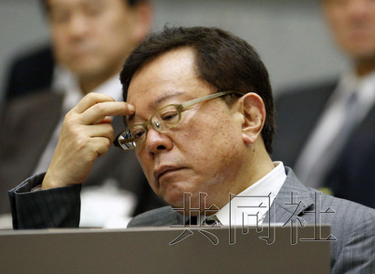 日本自民党高层敦促东京知事辞职以免影响奥运