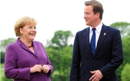 卡梅伦铺“最红地毯”接待默克尔亟需德伸出援手