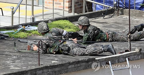 韩国军方否认抓获枪击肇事士兵父母劝说其自首