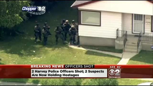 美警方与绑匪对峙20小时成功解救所有人质(图)