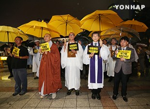 韩国宗教人士举行祈祷会呼吁制定沉船特别法