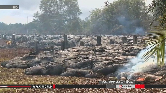 夏威夷一火山喷发岩浆流进山脚日本人墓地（图）