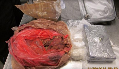 毒贩真空生肉包装中藏毒品行李检查时被抓现形